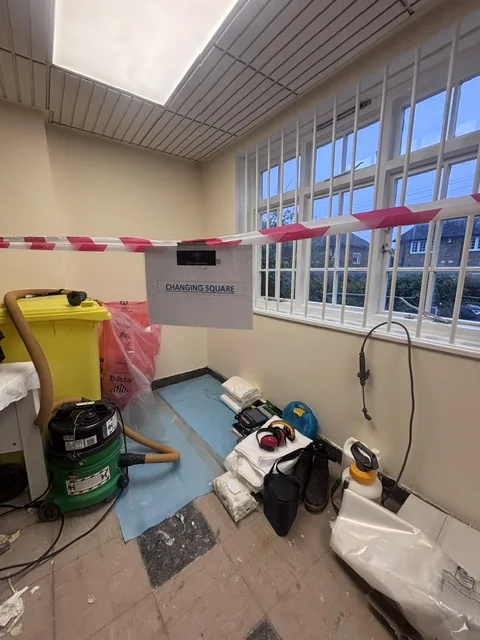 Asbestos floor tile and bitumen removal in Abbey Wood